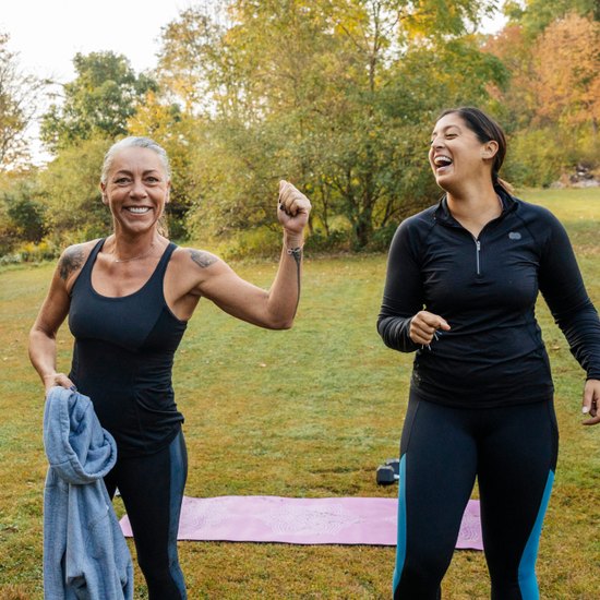 Two people exercising happy outside